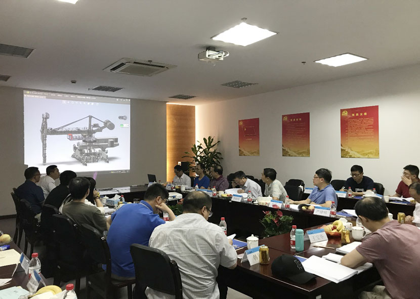 首台国内自主研发的螺旋卸煤机会议在杭州华新召开